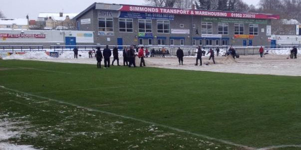 After removing the snow, volunteers pull off the frost covers