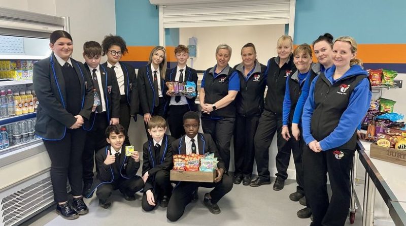 Pic: Catering staff at the opening of the new canteen at Burton Borough School with students Brooke Warren, Freddie Goulding, Hadiza Ababio, Edie-Mae Swinn, Max Harris, Sahib Sran, Joe Paginton, and Royce Olu-Olusegun.