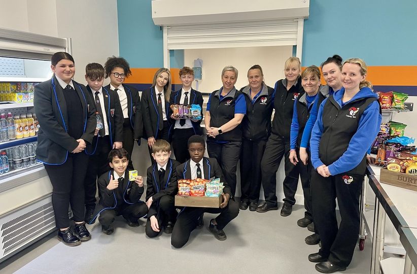 Pic: Catering staff at the opening of the new canteen at Burton Borough School with students Brooke Warren, Freddie Goulding, Hadiza Ababio, Edie-Mae Swinn, Max Harris, Sahib Sran, Joe Paginton, and Royce Olu-Olusegun.