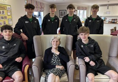 Young footballers visit care home