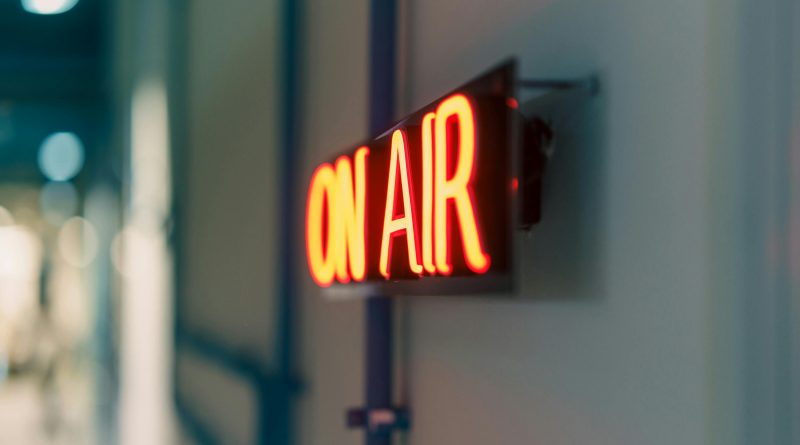 Photo by Jakub Zerdzicki: https://www.pexels.com/photo/illuminated-neon-on-air-sign-in-studio-34368004/